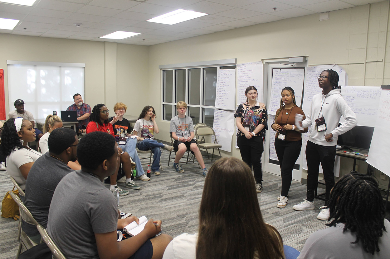 Writers collaborating around a table